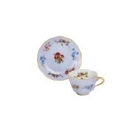 Coffee cup with purple Flora saucer